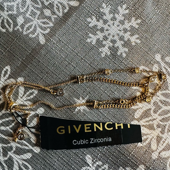 Givenchy Jewelry - Givenchy Bracelet NWOT as it felll off.  Cubic Zirconia and Gold. Sliding sizer